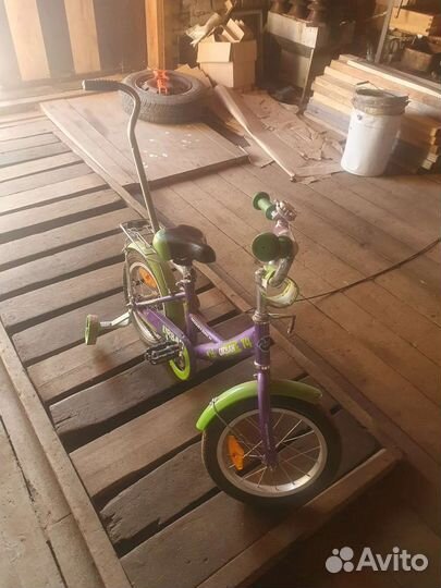 Детский велосипед с ручкой