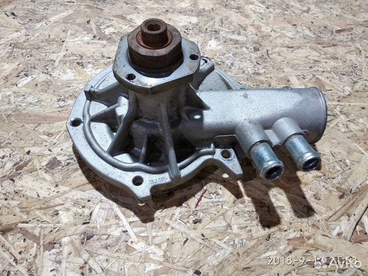 Помпа на опель омега двигатель 2.6л