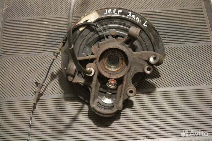 Кулак поворотный задний левый Jeep Grand Cherokee