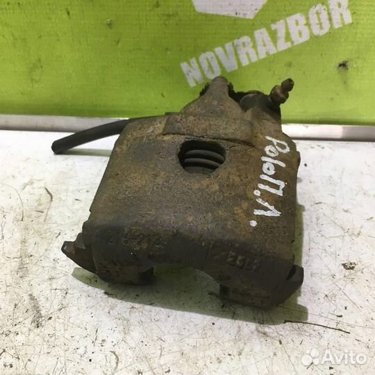 Суппорт передний левый Фольксваген Поло