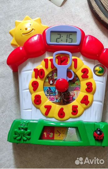 Обучающая интерактивная игрушка часы