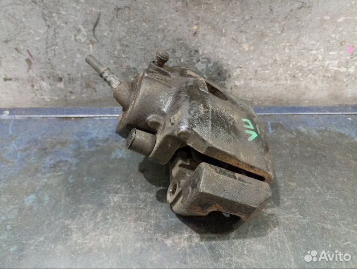 Суппорт передний Mazda Tribute EP