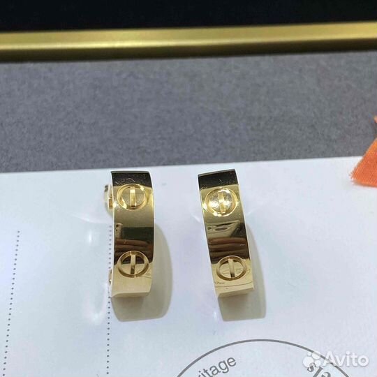 Золотые серьги Cartier