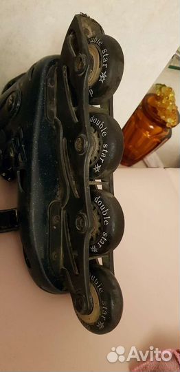 Роликовые коньки