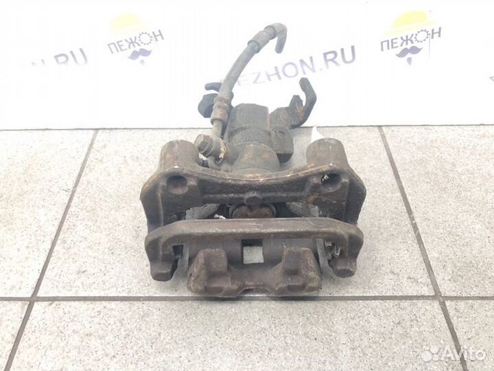 Суппорт тормозной задний левый Mazda Mazda6