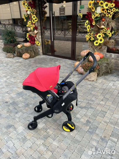 Продам автолюоьку коляску Doona