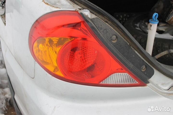Kia Spectra фонарь левый,правый