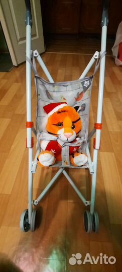 Детская игрушечная коляска