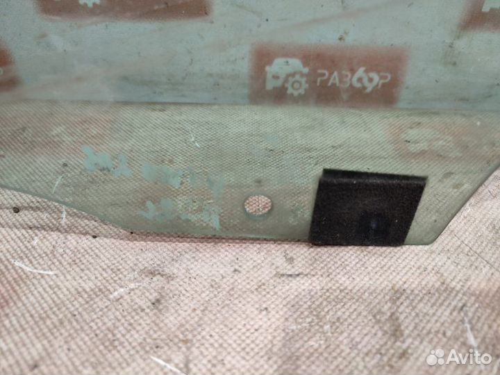 Стекло двери заднее левое Peugeot 206