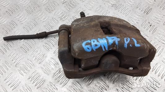 Суппорт тормозной передний левый chrysler PT cruis