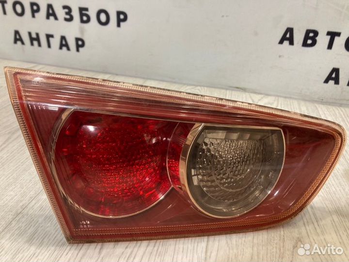 Фонарь в крышку багажника задний Mitsubishi Lancer