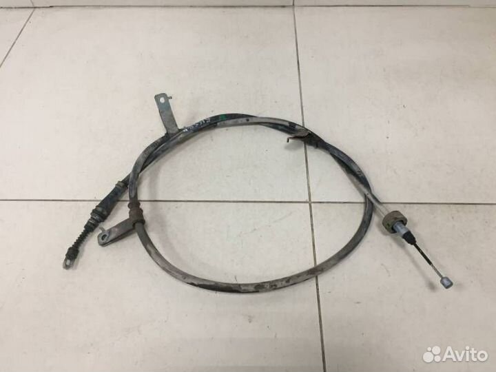 Трос стояночного тормоза левый Kia Cerato YD 2013