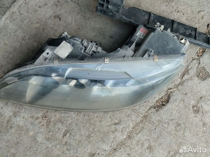 Фара левая mazda 3