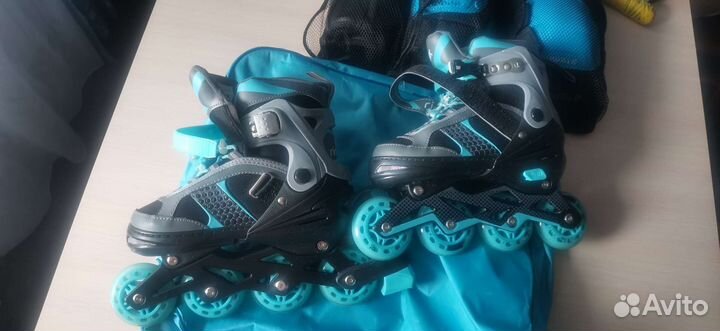 Роликовые коньки