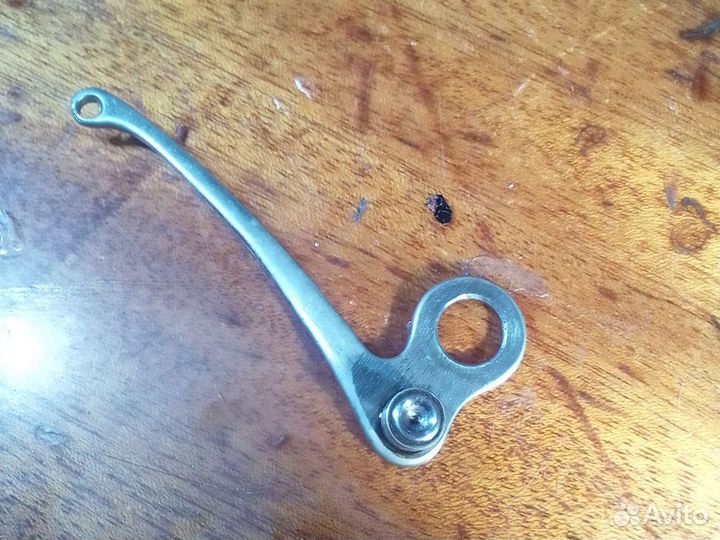 Нитеоттягиватель