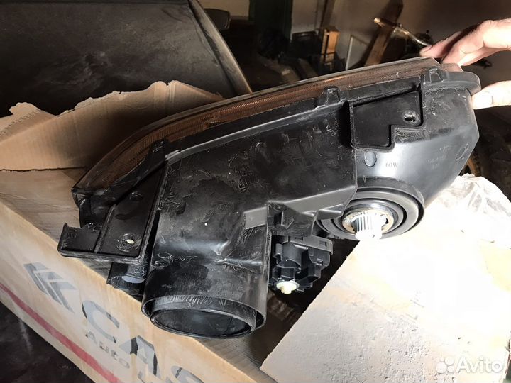 Фара левая Grand Vitara