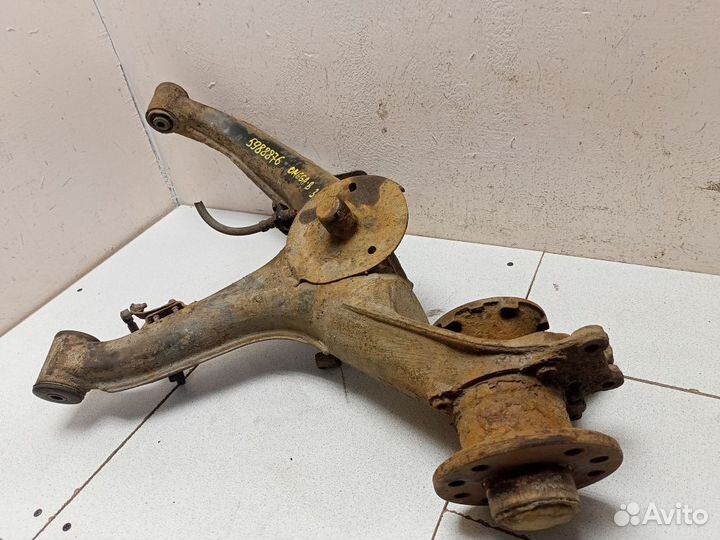 Рычаг задний левый 90576515