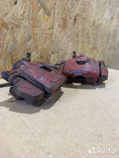 Суппорт тормозной передний Volkswagen Polo cедан