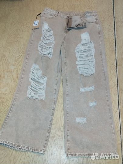 Джинсы рванные широкие
