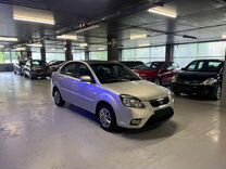 Kia Rio 1.4 AT, 2010, 177 000 км, с пробегом, цена 675 000 руб.