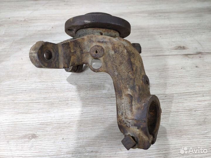 Кулак поворотный левый Peugeot 206