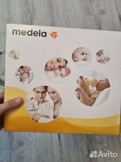 Молокоотсос medela mini electric