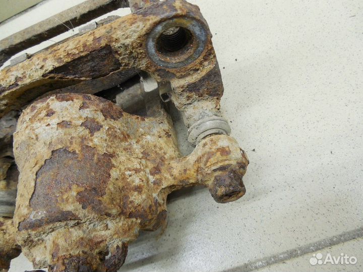 Суппорт задний левый X-Trail (T30) 2001-2006