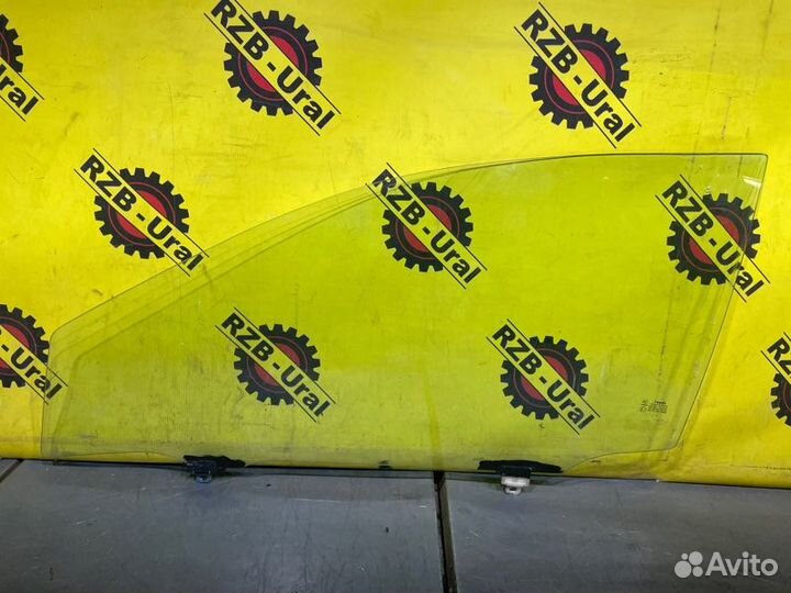 Стекло двери переднее левое Toyota Corolla Е150