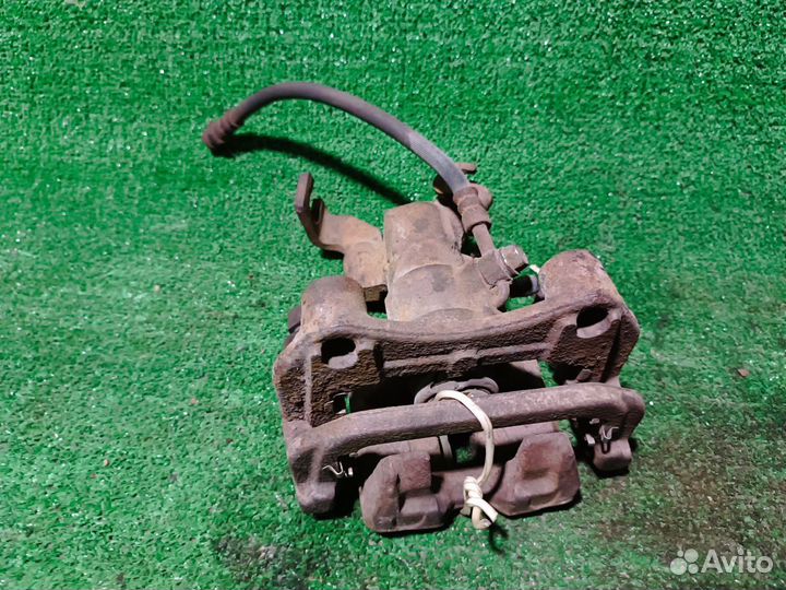 Суппорт тормозной задний левый Mazda 6