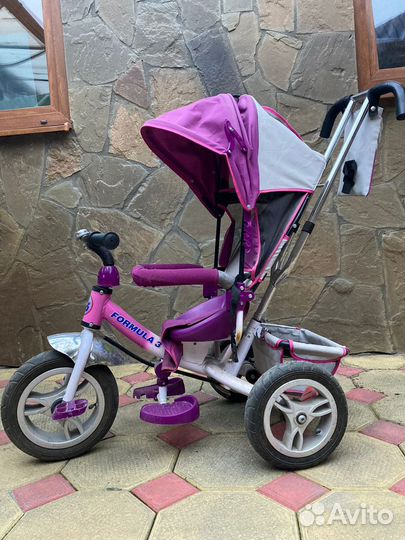 Трехколесный велосипед с ручкой