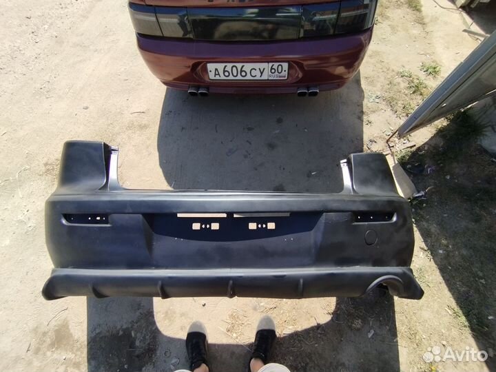 Задний бампер lancer 10