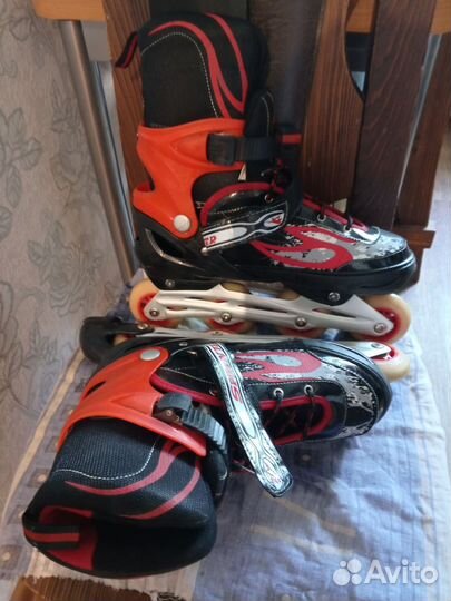 Коньки роликовые