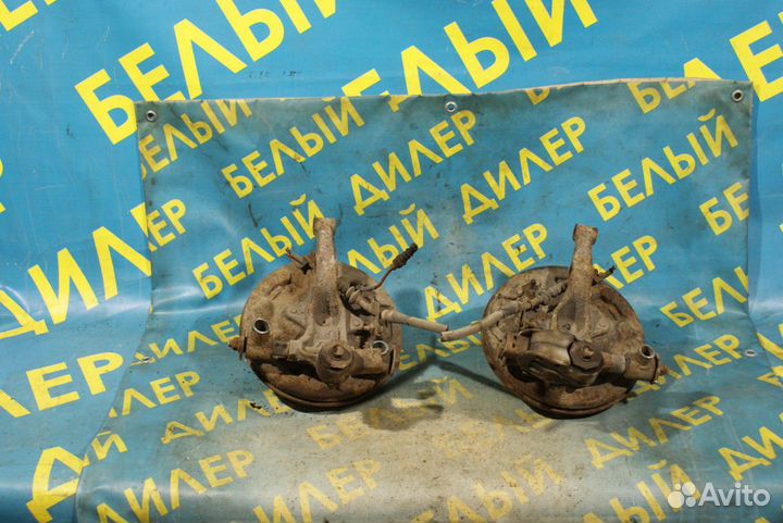 Задний поворотный кулак Mazda 323F BA