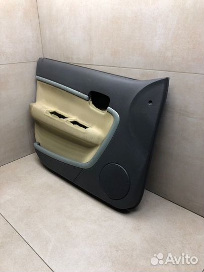 Обшивка двери передняя левая Chery Kimo S12 A1