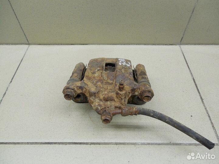 Суппорт задний левый X-Trail (T30) 2001-2006