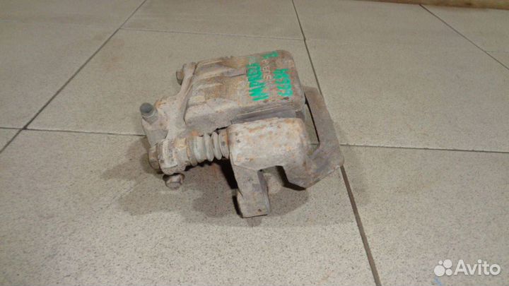 Суппорт задний левый Subaru Impreza 3