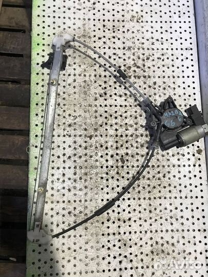 Стеклоподъемник задний правый (электрический) Mazd