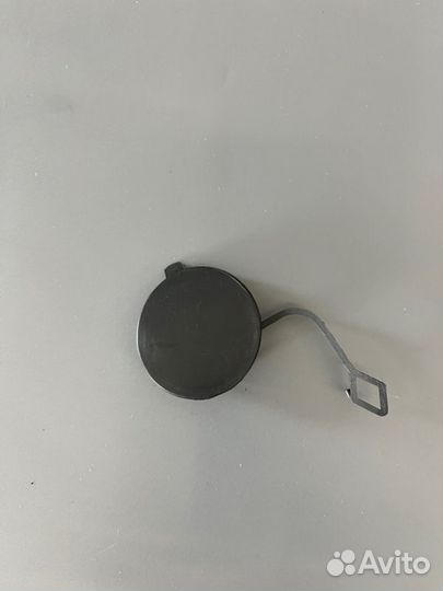 Заглушка крюка буксировки передняя левый