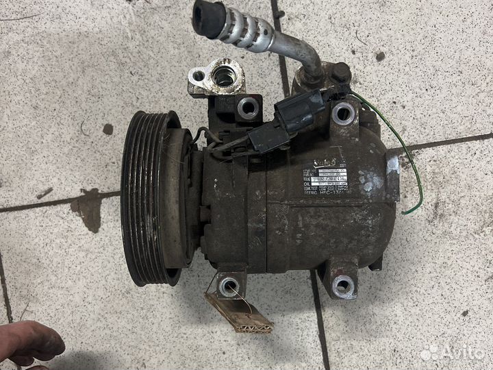 Компрессор кондиционера сан енг актион кайрон