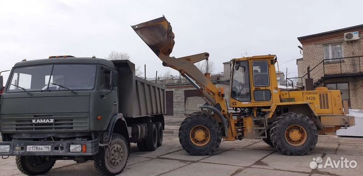 Услуги экскаватора погрузчика