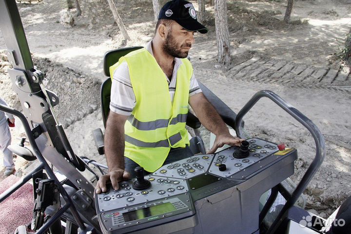 Оператор асфальтоукладчика