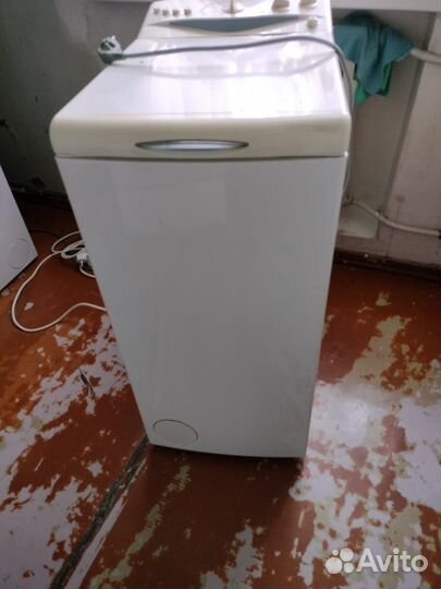 Стиральная машина с вертикальной загрузкой