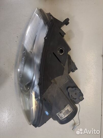 Фара (передняя) левая Volkswagen Passat 6