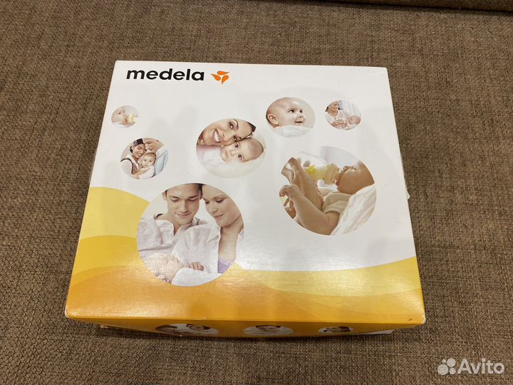 Молокоотсос medela mini electric