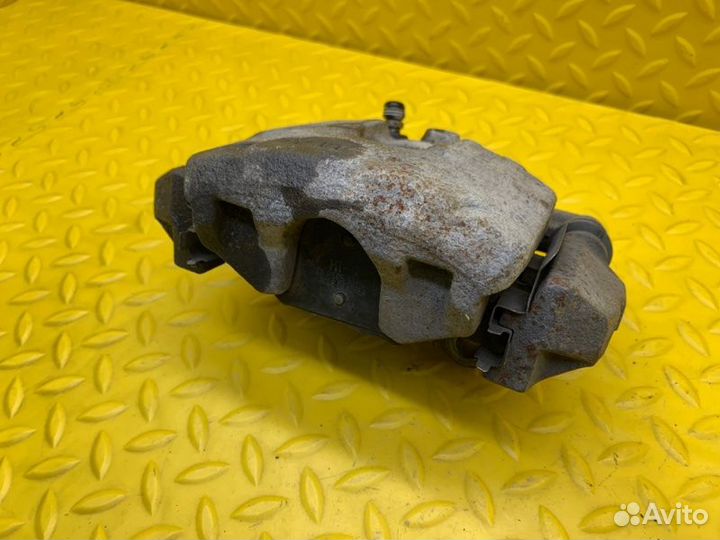 Суппорт тормозной передний правый Volkswagen Polo