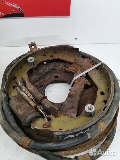 Щит опорный задний левый (Mitsubishi Galant)