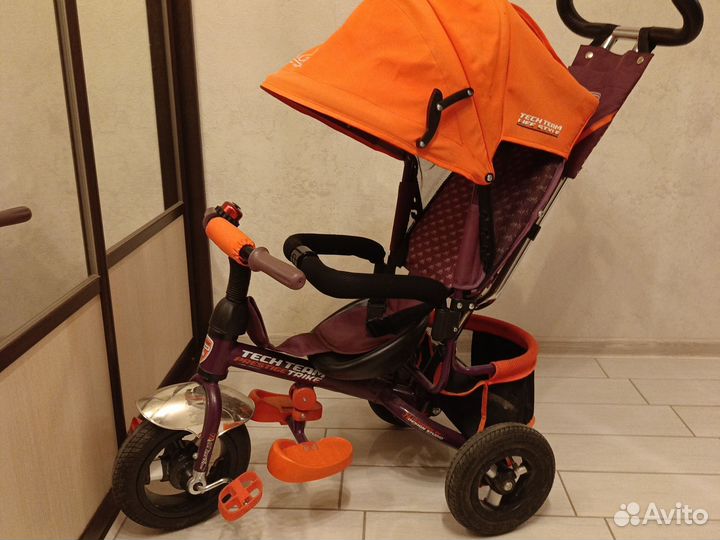 Трехколесный велосипед с ручкой