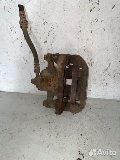 Суппорт тормозной Chevrolet Lacetti седан F14D3