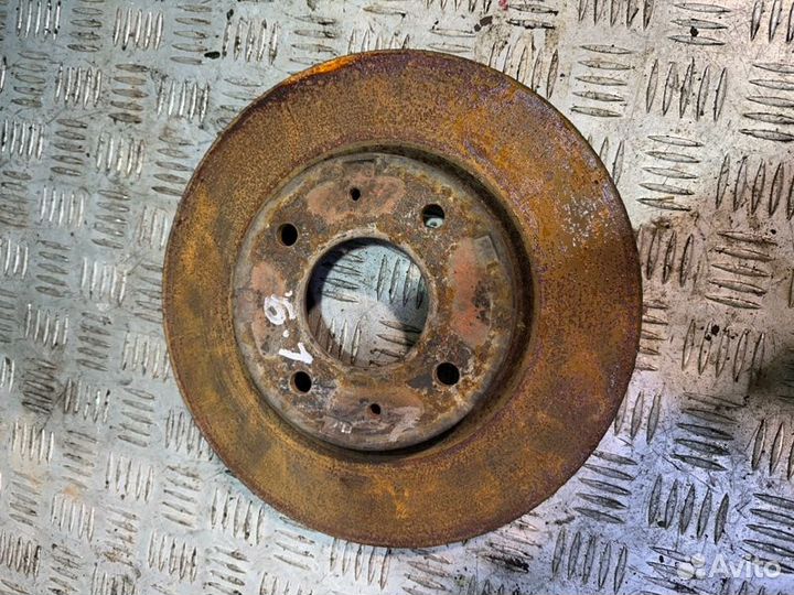 Диск тормозной передний Mitsubishi Lancer 9