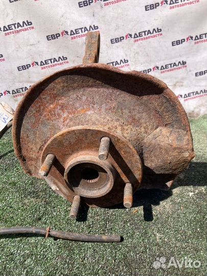 Кулак поворотный передний левый Mitsubishi Lancer